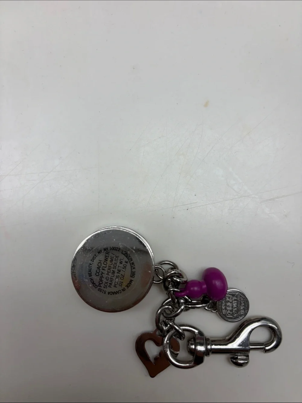 Very rare Coach Silver-Tone Keychain with Bright Purple Accents and lip gloss